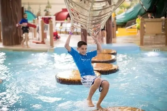 child having fun at the water park
