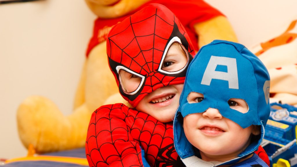 kids dressed up as superheros